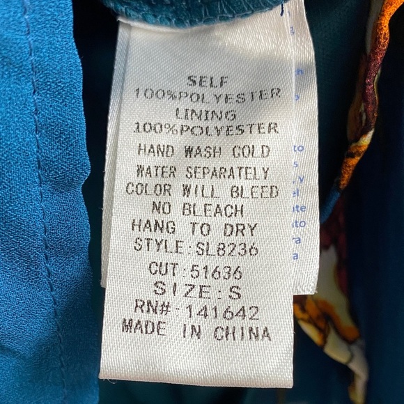 She + Sky Teal Floral Romper - Picture 7 of 7